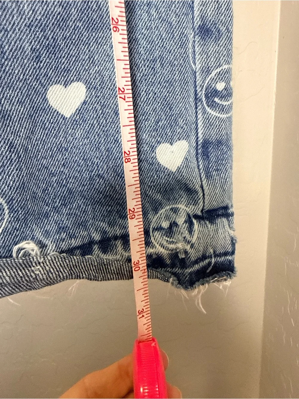 Girls Old Navy baggy wide leg jeans with white smile & heart print